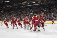 Denver celebrates after defeating Boston College in the Frozen Four championship game of the men's NCAA college hockey tournament Saturday, April 13, 2024, in St. Paul, Minn. (AP Photo/Abbie Parr)