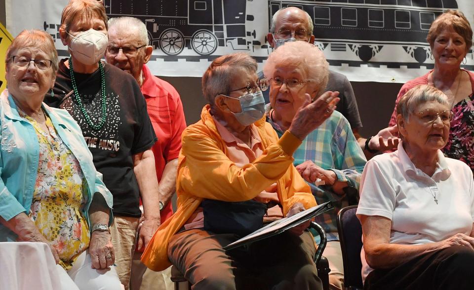 Alice Thompson, center, 98, performs with the Green Birds chorus during the Senior Variety Show rehearsal at Ames City Auditorium on Monday in Ames.