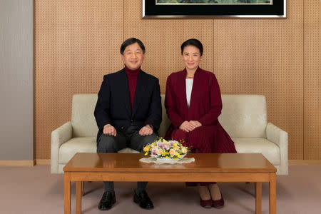 Japan's Crown Prince Naruhito (L) and Japan's Crown Princess Masako pose for a photograph at their residence in Tokyo, in this handout picture taken by Imperial Household Agency of Japan on December 5, 2017. REUTERS/Imperial Household Agency of Japan/Handout via Reuters.