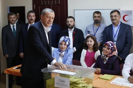 Turkish President Tayyip Erdogan cast his ballot at a polling station during the parliamentary election in Istanbul, Turkey, June 7, 2015. REUTERS/Murad Sezer