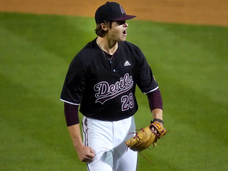 Apr 7, 2023; Phoenix, AZ, USA; ASU Sun Devils pitcher Owen Stevenson celebrates striking out the final batter duirng their 6-2 win against the Washington State Cougars at Phoenix Municipal Stadium. 