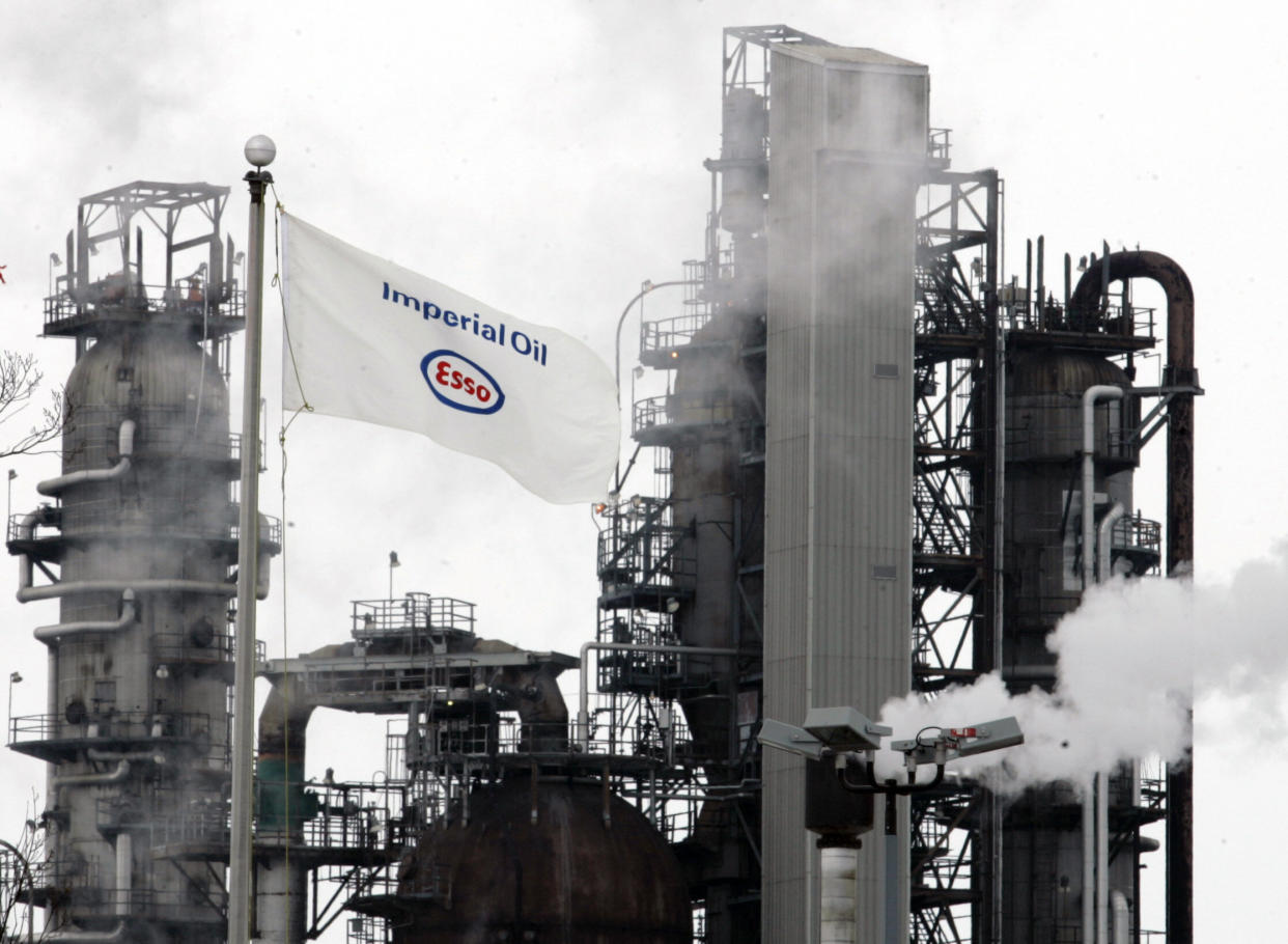 Smoke rises from stacks as processing slowly resumes at the Imperial Oil refinery. (Photo: JP Moczulski / Reuters)