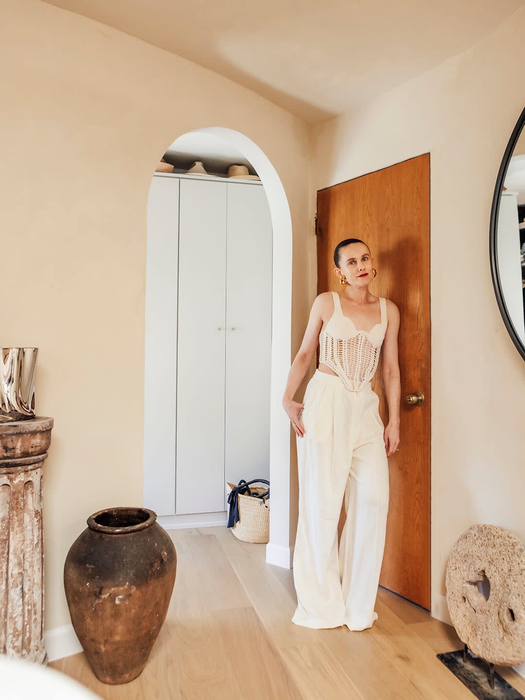 woman leaning on door