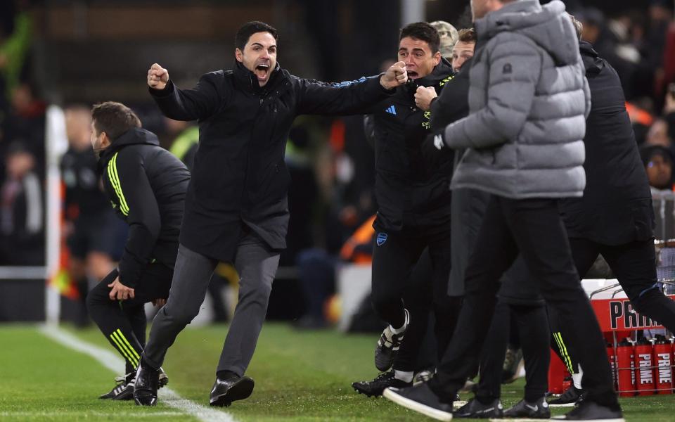 Mikel Arteta, Manager of Arsenal, celebrates after Declan Rice of Arsenal (not pictured) scores the team's fourth goal during the Premier League match between Luton Town and Arsenal FC at Kenilworth Road on December 05, 2023 in Luton, England