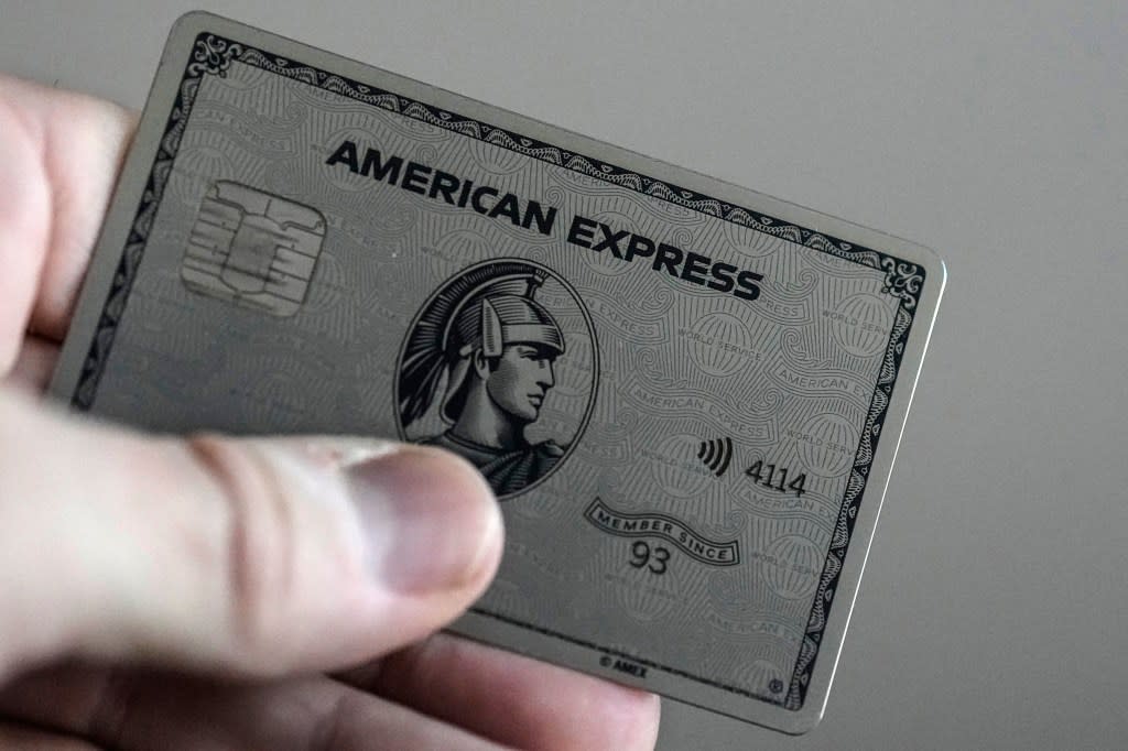 A combination of inflation, increased interest rates, and the end of pandemic-tied relief, such as the moratorium on student loan payments, has led to record credit card debt, experts say. (AP Photo/Mike Stewart)