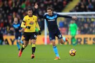 <p>Cristhian Stuani of Middlesbrough (R) is put under pressure from Etienne Capoue of Watford</p>