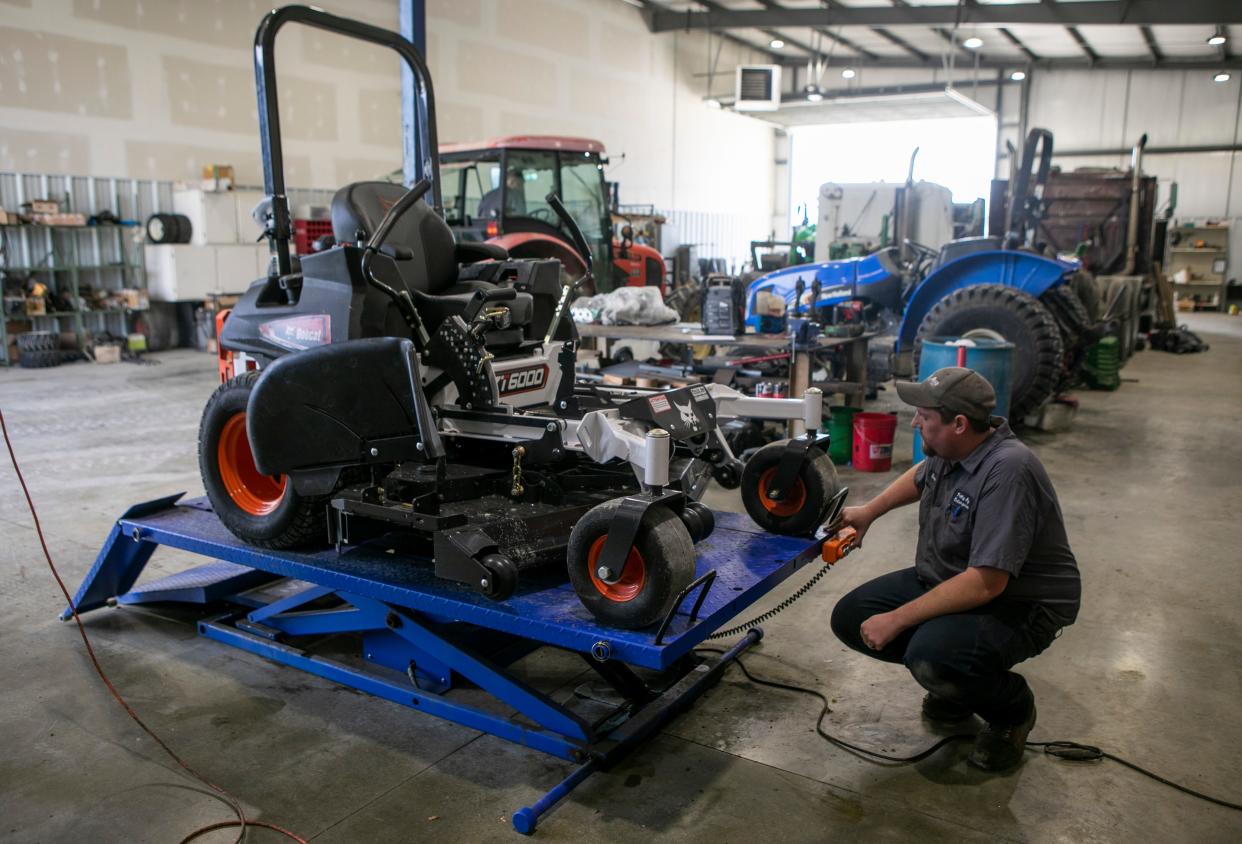 Steven Kessler, Lawn and Garden Services Manager, prepares to do a post delivery inspection on a Bobcat lawn mower in the service area at Foltz Ag on Apr. 17, 2024, in Lancaster, Ohio.