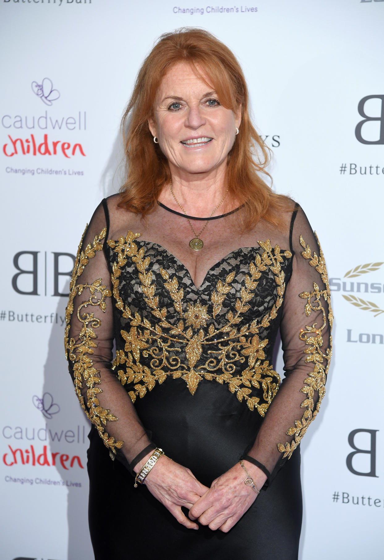 Sarah Ferguson wore a black and gold sheer gown to the Butterfly Ball