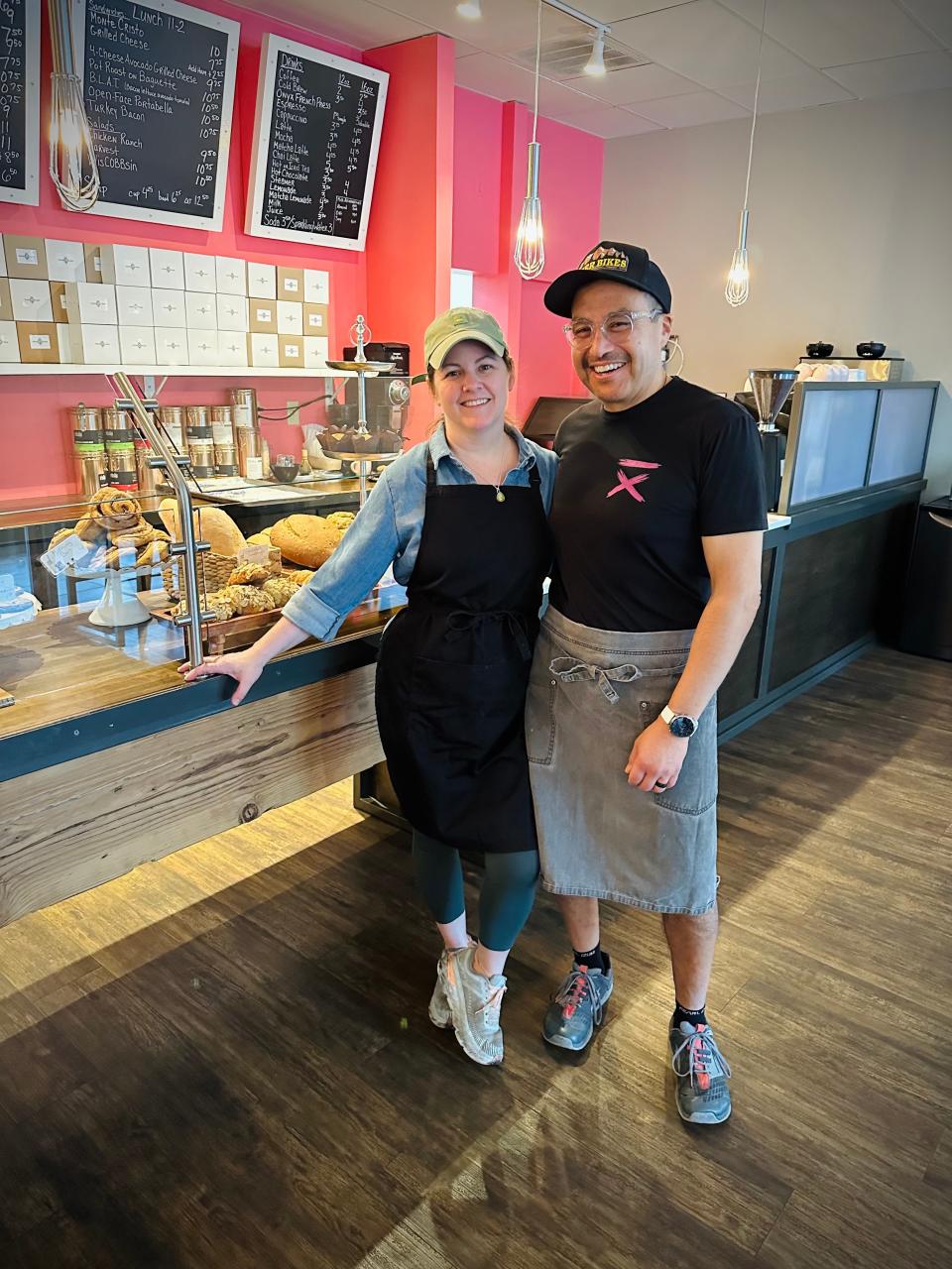 Karen and George Herrera stand for a photo at their bakery Sugar and Flour in Greendale. The the couple is a new café and bakery in the R1VER campus