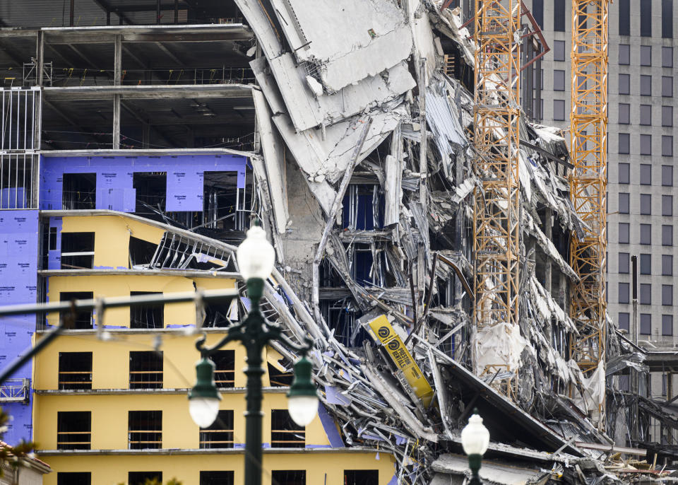 The Hard Rock Hotel partially collapsed onto Canal Street downtown New Orleans, Louisiana on October 12, 2019. - One person died and at least 18 others were injured Saturday when the top floors of a New Orleans hotel that was under construction collapsed, officials said.
The New Orleans fire department received reports at 9:12am local time that the Hard Rock Hotel in downtown New Orleans had collapsed. (Photo by Emily Kask / 30238387A / AFP) (Photo by EMILY KASK/30238387A /AFP via Getty Images)