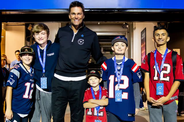 <p>Fanatics</p> Tom Brady hangs out with fans at Fanatics and Make-A-Wish event