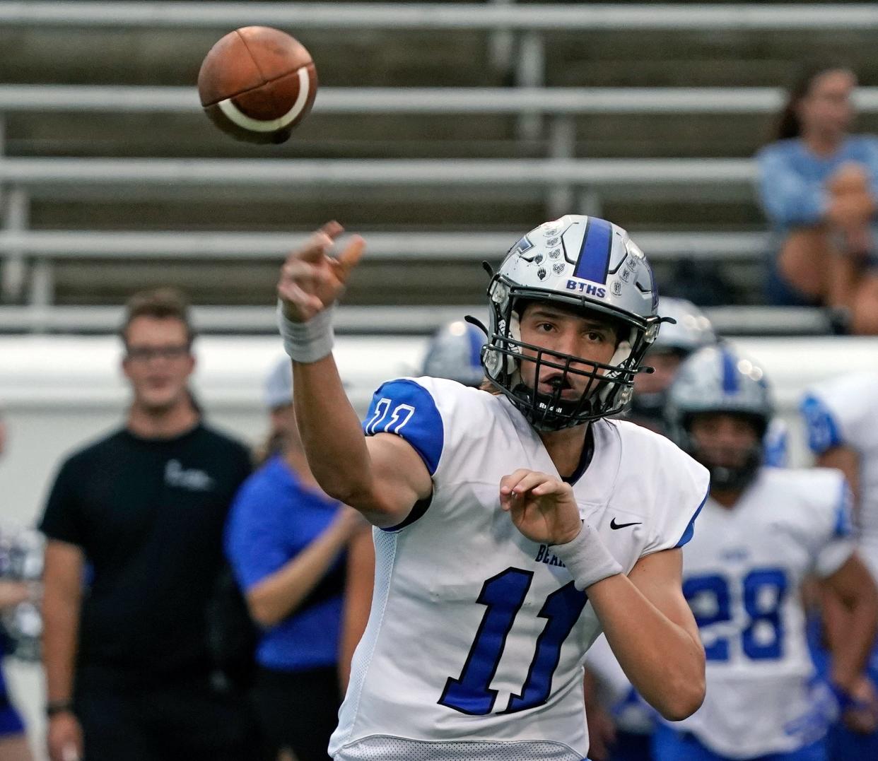 Bartram Trail QB Riley Trujillo (11) looks to pass during a game with Mainland at Daytona Stadium in Daytona Beach, Friday, Sept. 9, 2022.