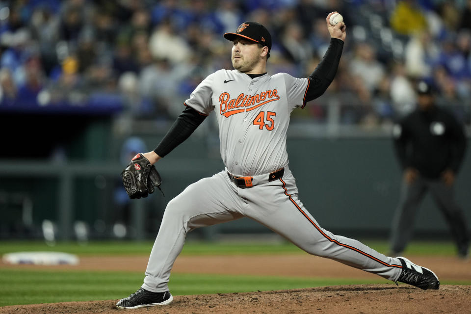 Baltimore Orioles relief pitcher Keegan Akin throws during the sixth inning of a baseball game against the Kansas City Royals Friday, April 19, 2024, in Kansas City, Mo. (AP Photo/Charlie Riedel)