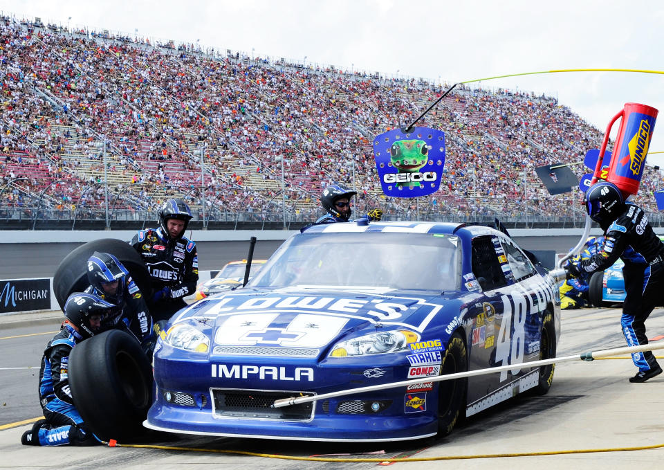 BROOKLYN, MI - JUNE 17: Jimmie Johnson, driver of the #48 Lowe's Chevrolet, pits during the NASCAR Sprint Cup Series Quicken Loans 400 at Michigan International Speedway on June 17, 2012 in Brooklyn, Michigan. (Photo by John Harrelson/Getty Images for NASCAR)