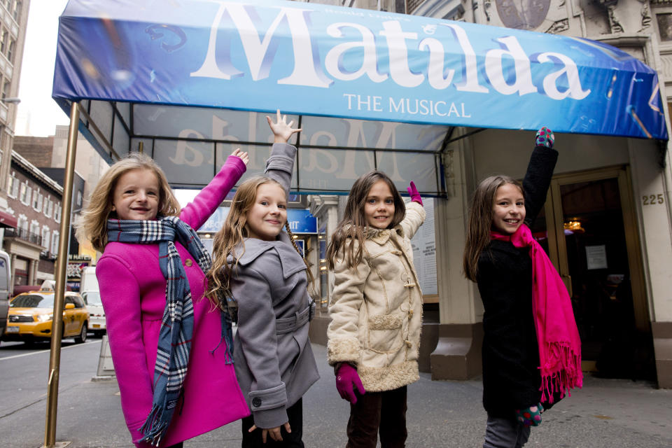 Actors, from left, Milly Shapiro, Sophia Gennusa, Oona Laurence and Bailey Ryon, who will share the title role in "Matilda the Musical" on Broadway, pose for a portrait outside the Shubert Theatre, on Thursday, Nov. 15, 2012 in New York. (Photo by Charles Sykes/Invision/AP)