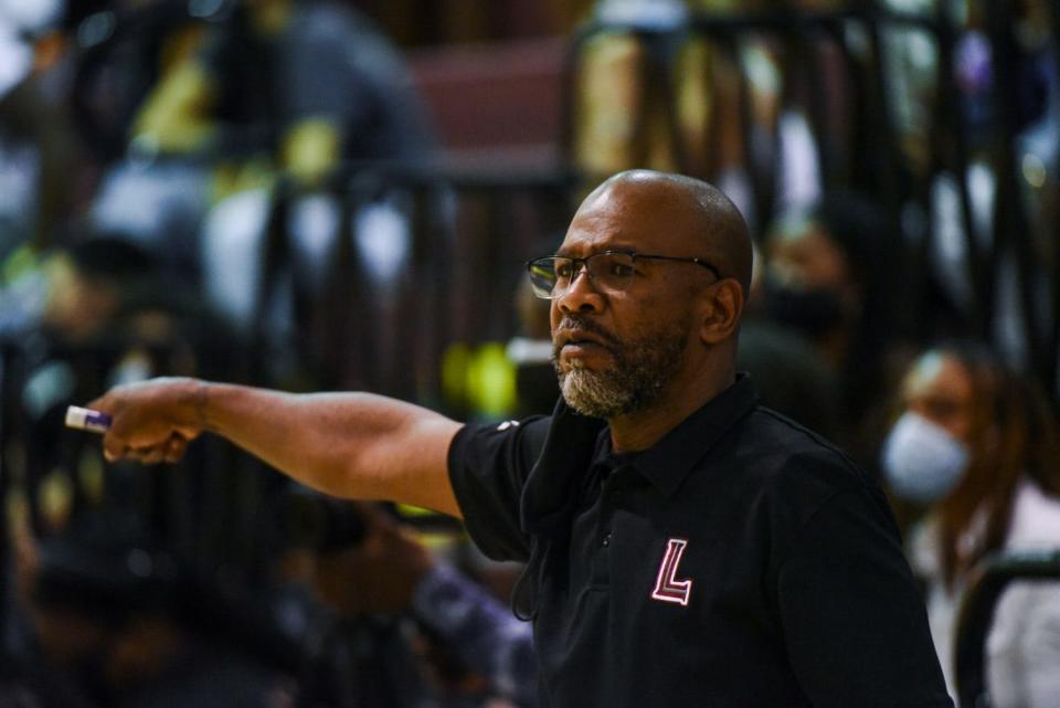 Palm Beach Lakes head coach Edwin James points down to the Rams side of the court during the basketball game between Suncoast and host Palm Beach Lakes in West Palm Beach, FL, on Saturday, January 9, 2022. Final score, Palm Beach Lakes, 52, Suncoast, 51.