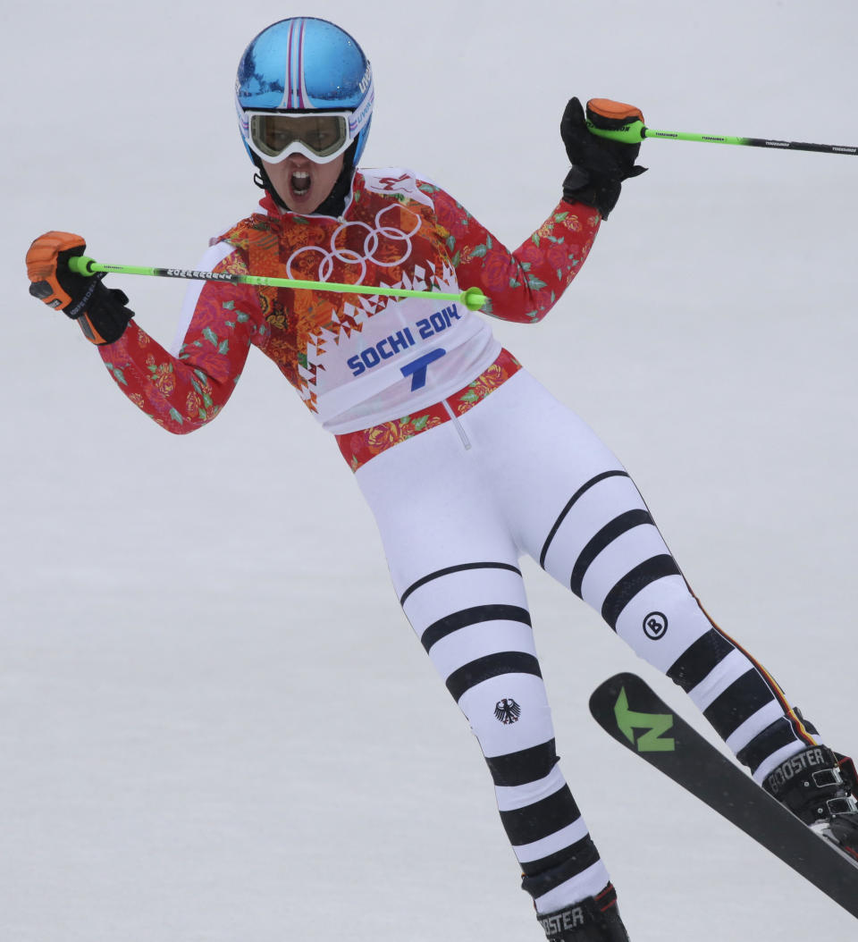 Germany's Viktoria Rebensburg celebrates after finishing the second run of the women's giant slalom at the Sochi 2014 Winter Olympics, Tuesday, Feb. 18, 2014, in Krasnaya Polyana, Russia. (AP Photo/Gero Breloer)