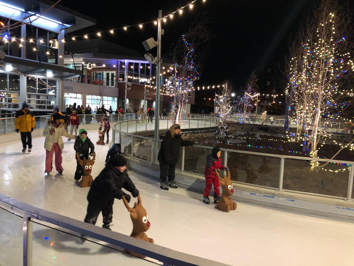 Skaters try out the new Ironworks Ice Rink on its opening night Dec. 3, 2022, at Mishawaka's Beutter Park.