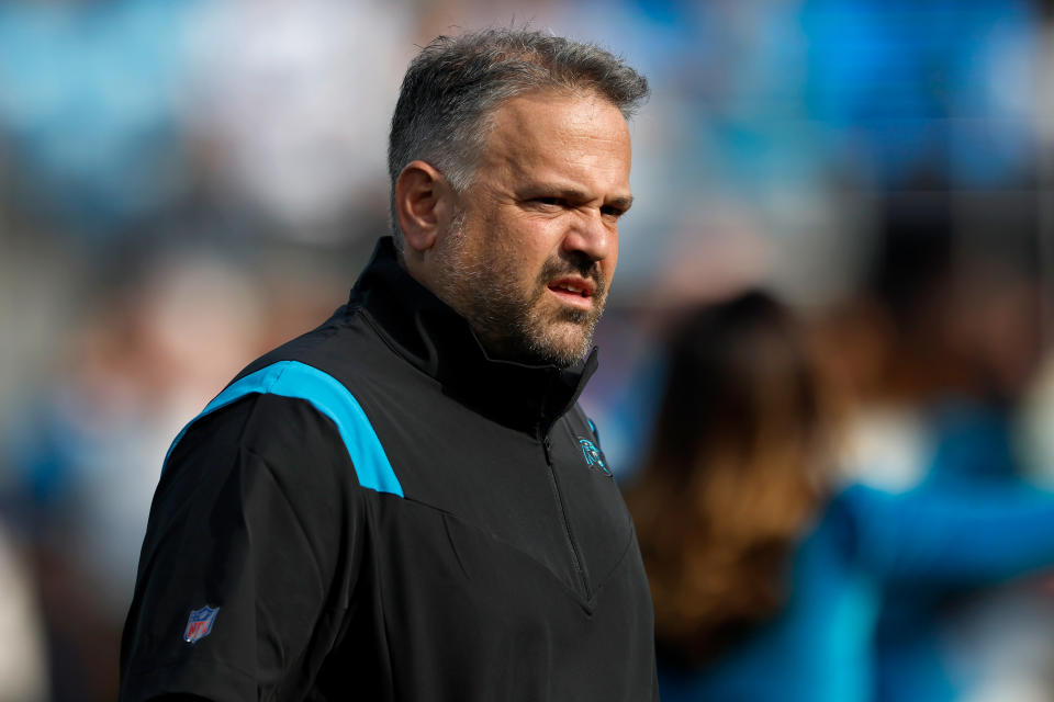 CHARLOTTE, NORTH CAROLINA - DECEMBER 26: Head coach Matt Rhule of the Carolina Panthers walks onto the field before the game against the Tampa Bay Buccaneers at Bank of America Stadium on December 26, 2021 in Charlotte, North Carolina. (Photo by Grant Halverson/Getty Images)