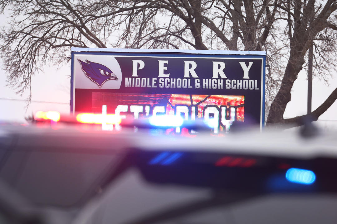 A police cruiser sits outside Perry Middle School and High School following Thursday's shooting. (Scott Olson/Getty Images)