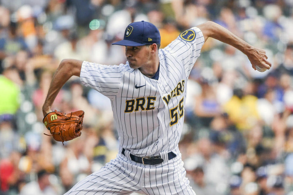 Milwaukee Brewers' Hoby Milner pitches during the sixth inning of a baseball game against the Colorado Rockies, Sunday, July 24, 2022, in Milwaukee. (AP Photo/Kenny Yoo)