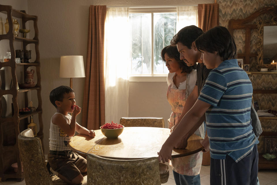 This image released by Searchlight Pictures shows, from left, Brice Gonzalez, Annie Gonzalez, Jesse Garcia and Hunter Jones in a scene from "Flamin' Hot," a tale of how a Mexican American janitor came up with the idea for Flamin’ Hot Cheetos. (Emily Aragones/Searchlight Pictures via AP)