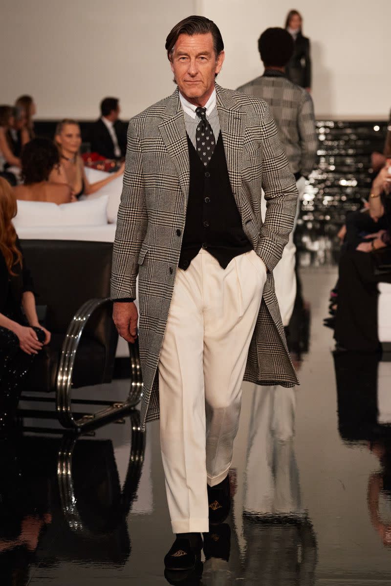 Tim Easton walking in the Ralph Lauren F/W 2022 show in March 2022.