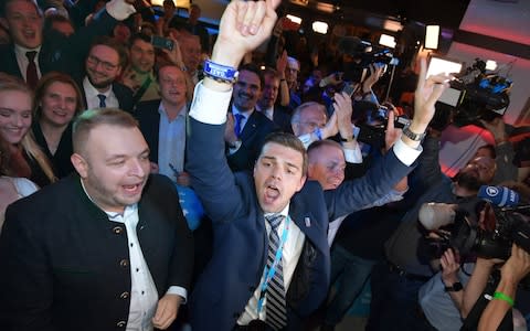 Supporters of the the German right-wing populist party 'Alternative for Germany' (AfD), react - Credit: EPA/THORSTEN WAGNER