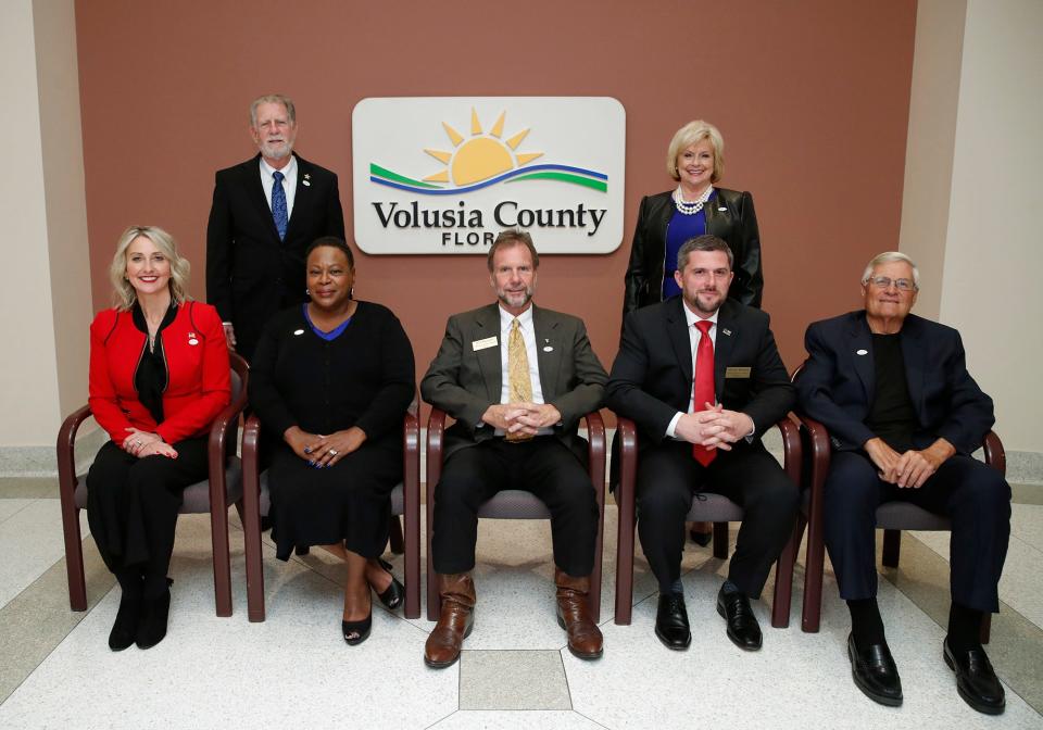 Volusia County Council members posed for their official photo in January 2021. Standing are Ben Johnson and Billie Wheeler. Seated from left to right are Heather Post, Barbara Girtman, Jeff Brower, Danny Robins and Fred Lowry.