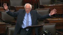 In this image from video, Sen. Bernie Sanders, I-Vt., speaks on the Senate floor at the U.S. Capitol in Washington, Wednesday, March 25, 2020. (Senate Television via AP)