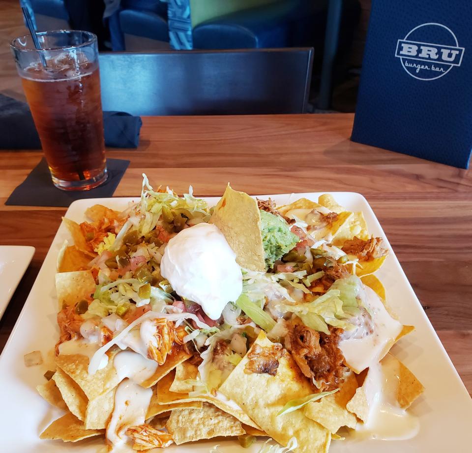 BBQ nachos with both barbecue chicken and barbecue pork are one of the appetizers available at the new Bru Burger Bar in Bloomington.