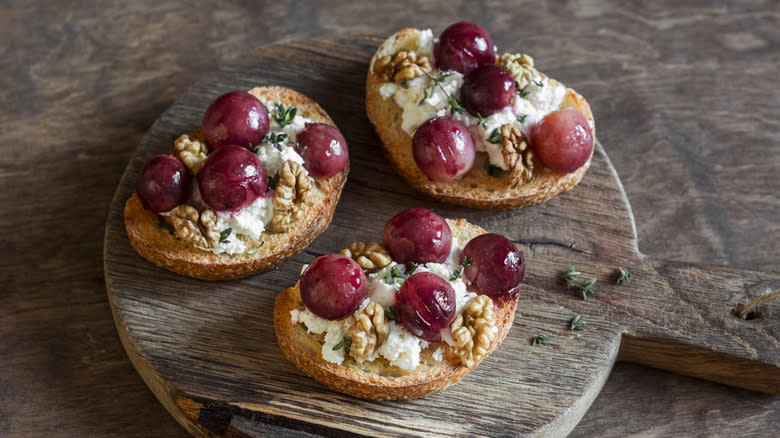 crostini topped with roasted grapes