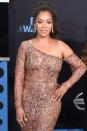 <p>La La Anthony dazzled with golden champagne touches of glamour from head-to-toe. (Photo: Getty) </p>