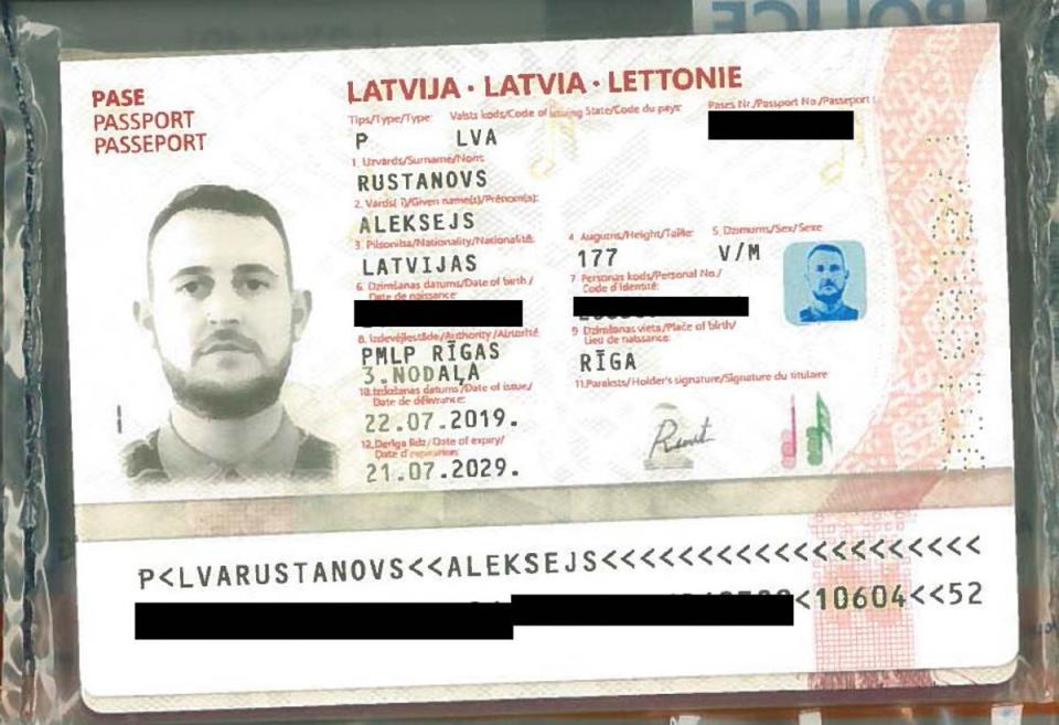 A fraudulently-obtained genuine (FOG) Latvian passport in the name of Aleksejs Rustanovs issued to Christopher Hughes (National Crime Agency/PA Wire)