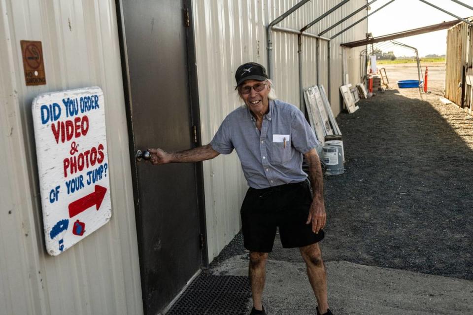 William Dause, the founder of the Parachute Center who is the face of the business, closes the door for the day at the skydiving facility at the Lodi Airport in September.