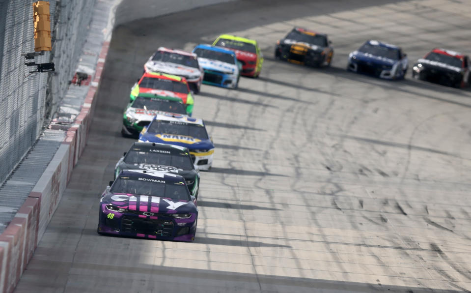 DOVER, DELAWARE - MAY 16: Alex Bowman, driver of the #48 Ally Chevrolet, leads the field during the NASCAR Cup Series Drydene 400 at Dover International Speedway on May 16, 2021 in Dover, Delaware. (Photo by James Gilbert/Getty Images) | Getty Images