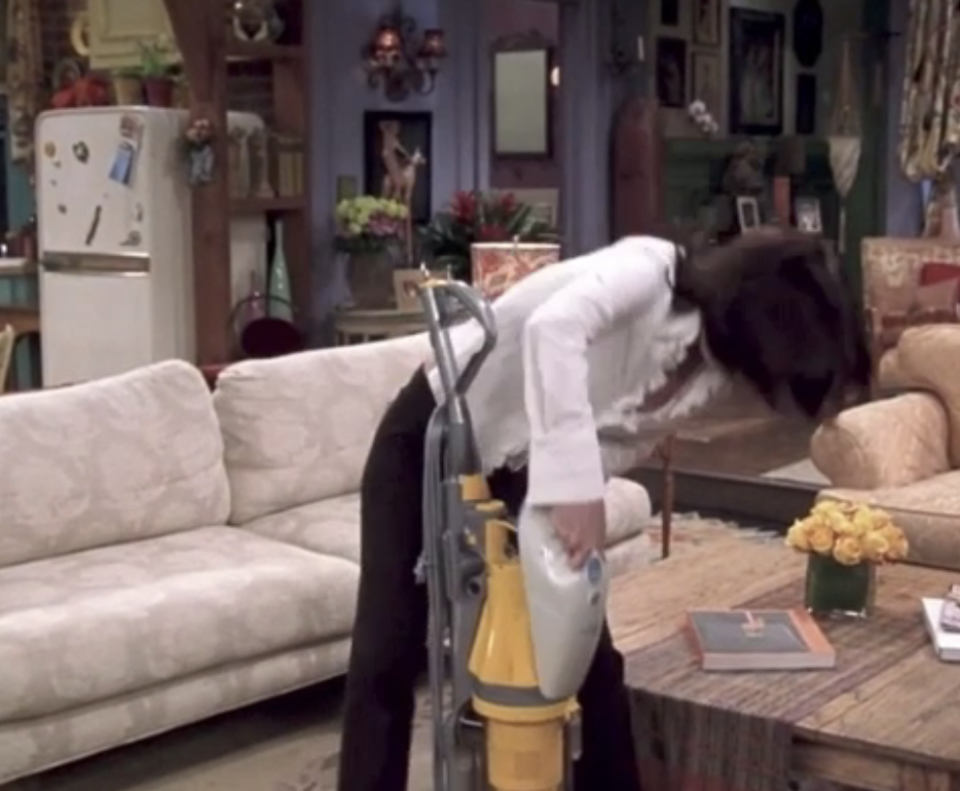 Monica Geller from "Friends" vacuuming her vacuum