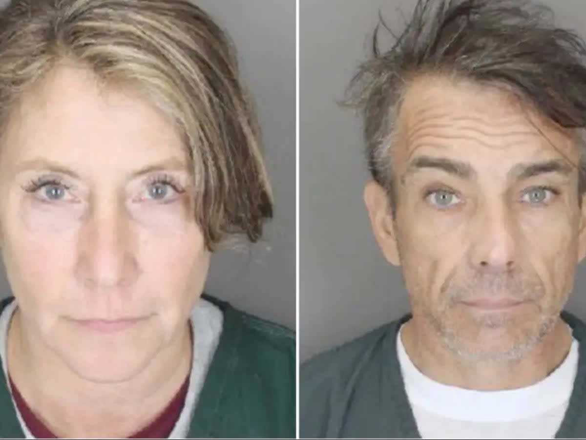 Jacqueline Jewett and Raymond Bouderau during processing in Suffolk County. The pair were indicted by a grand jury for burglary and larceny charges after they allegedly stole more than $1m from a wealthy woman’s two homes (Suffolk County District Attorney)