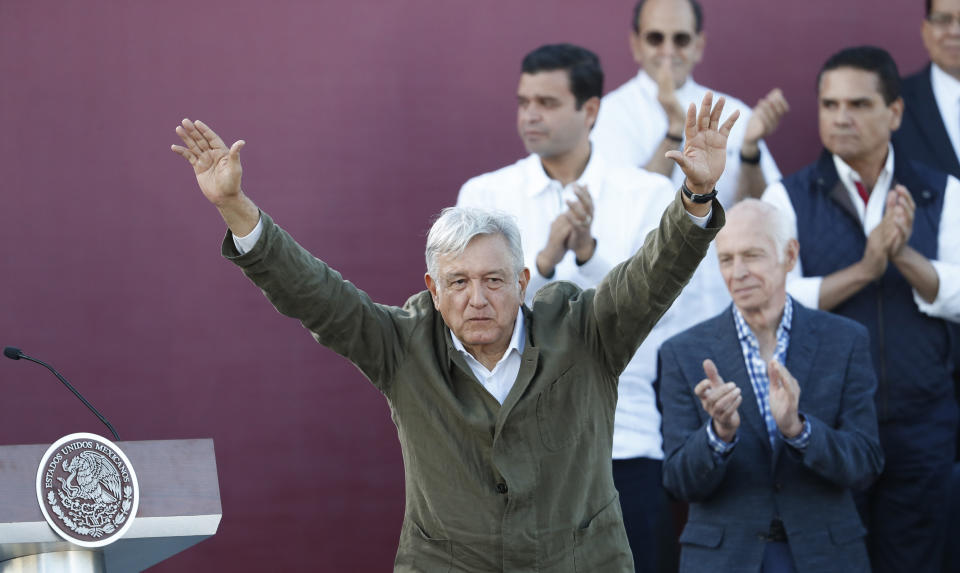 Mexican President Andres Manuel Lopez Obrador receives the applause of the crowd during a rally in Tijuana, Mexico, Saturday, June 8, 2019. Mexican President Andres Lopez Obrador held the rally in Tijuana even as President Trump has put on hold his plan to begin imposing tariffs on Mexico on Monday, saying the U.S. ally will take "strong measures" to reduce the flow of Central American migrants into the United States. (AP Photo/Eduardo Verdugo)