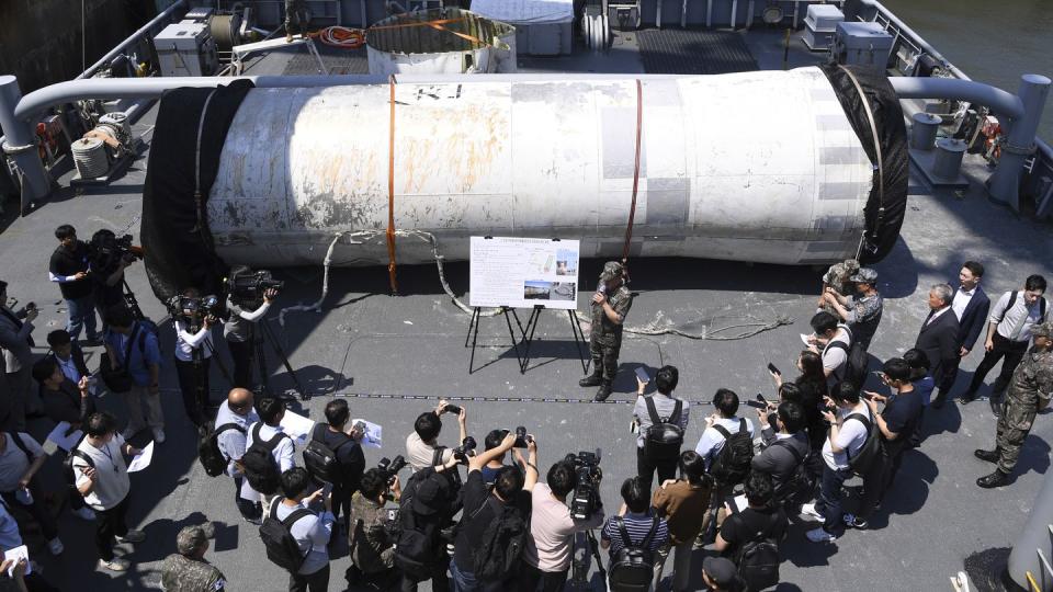 FILE- Objects salvaged by South Korea's military that are presumed to be parts of the North Korean space-launch vehicle that crashed into sea following a launch failure, are displayed at the Navy's 2nd Fleet Command in Pyeongtaek, South Korea, Friday, June 16, 2023. (Yonhap via AP, File)