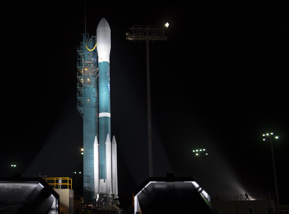 The United Launch Alliance (ULA) Delta II rocket with the NASA Ice, Cloud and land Elevation Satellite-2 (ICESat-2) onboard is seen shortly after the mobile service tower at SLC-2 was rolled back, Saturday, Sept. 15, 2018, at Vandenberg Air Force Base, Calif. The ICESat-2 mission will measure the changing height of Earth's ice. (Bill Ingalls/NASA via AP)