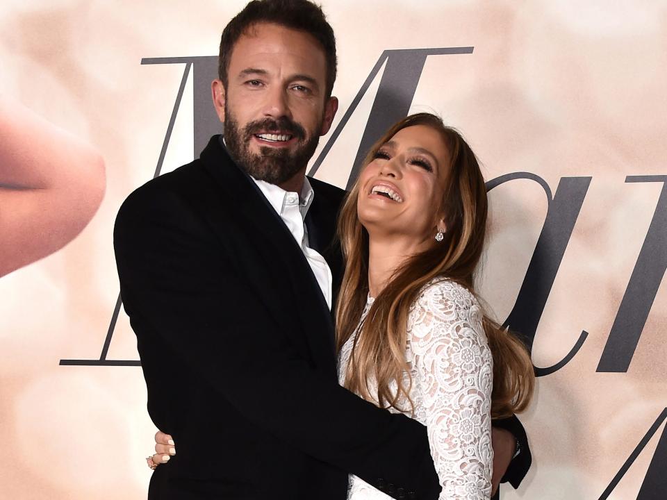 Ben Affleck with his arms around Jennifer Lopez at the LA screening of "Marry Me."