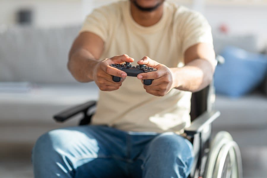 Playing video games has long been a challenge for people with disabilities. (Source: Adobe Stock)