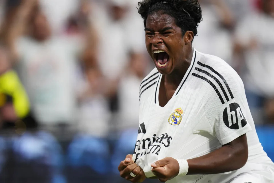 Real Madrid's Endrick celebrates after scoring his side's third goal during the Spanish La Liga soccer match between Real Madrid and Valladolid at the Santiago Bernabeu stadium in Madrid, Spain, Sunday, Aug. 25, 2024. (AP Photo/Manu Fernandez)