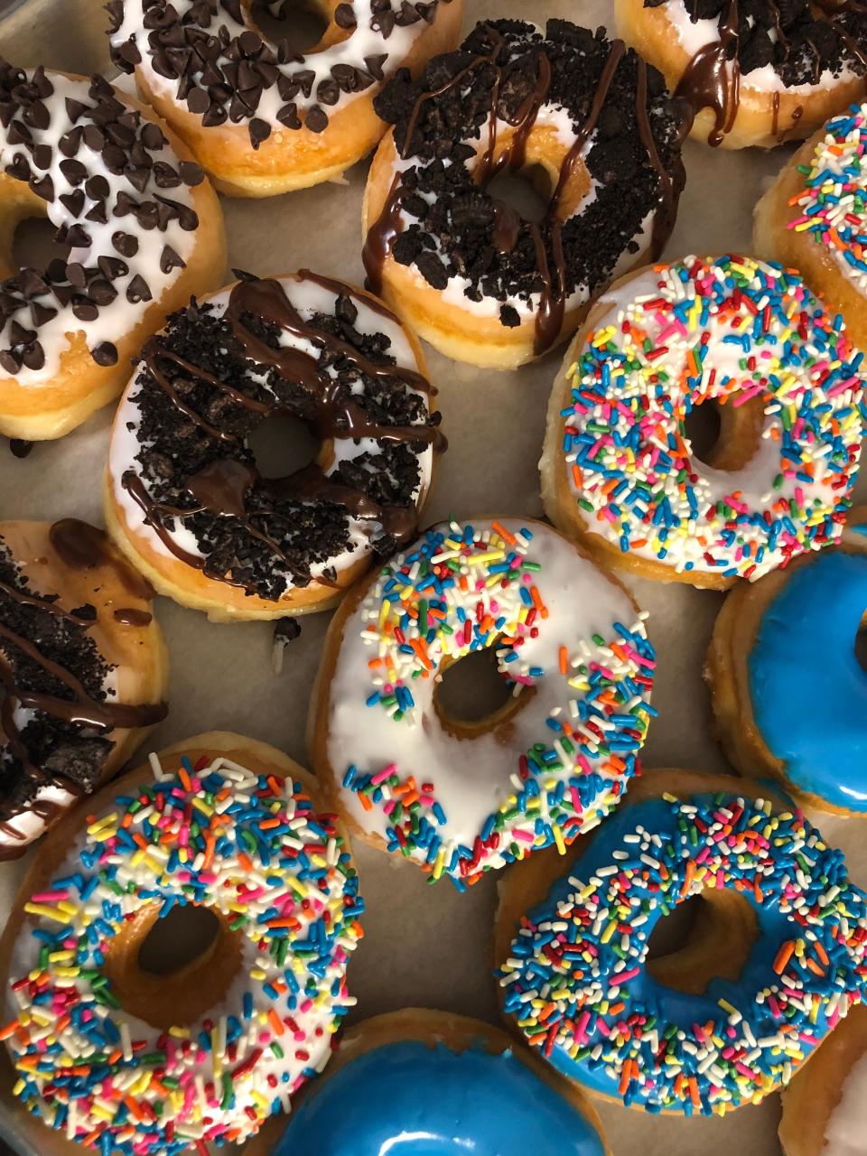 White Iced And Dough Baby Blue doughnuts from Dough Baby Donuts