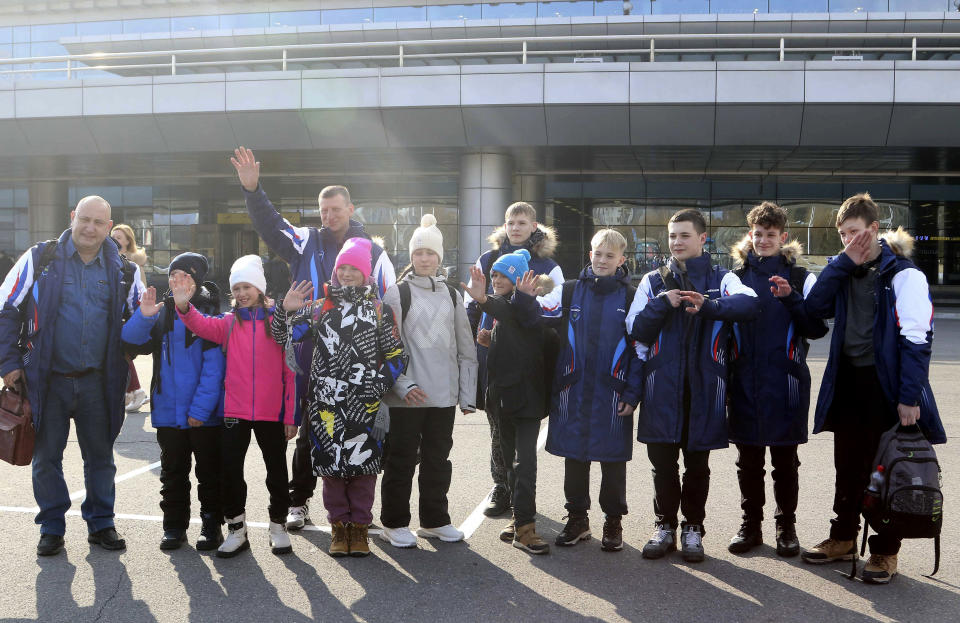 A group of Russian tourists, likely the first foreign travelers from any country to enter North Korea since the pandemic arrive at the Pyongyang International Airport in Pyongyang, North Korea, Friday, Feb. 9, 2024. (AP Photo/Cha Song Ho)