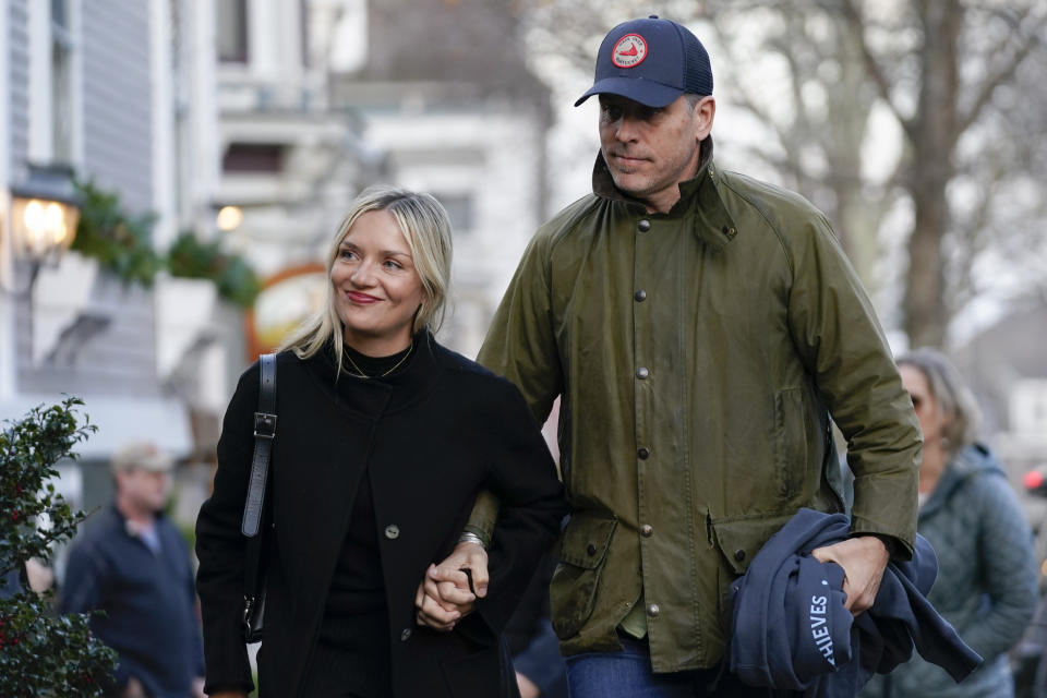 Hunter Biden walks with wife Melissa Cohen as they visit shops with President Joe Biden and first lady Jill Biden in Nantucket, Mass., Friday, Nov. 24, 2023. (AP Photo/Stephanie Scarbrough)