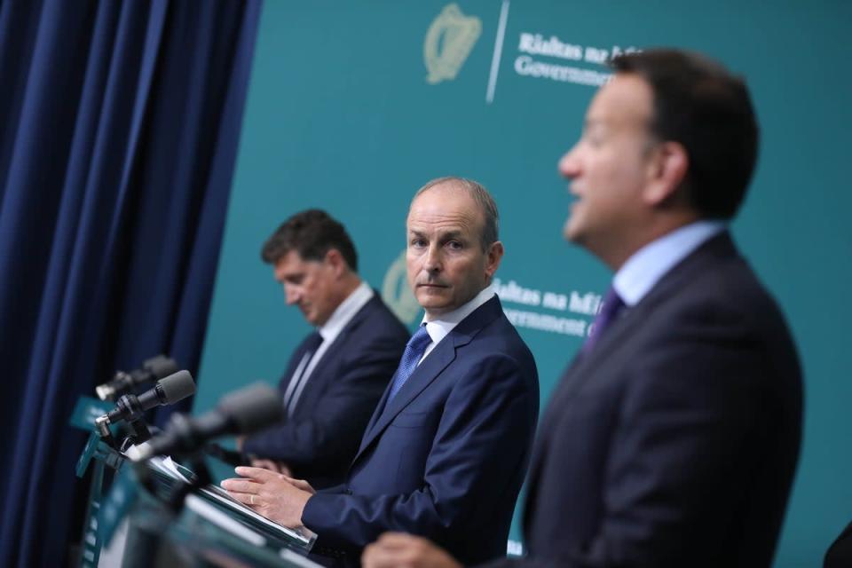 (left to right) Eamon Ryan Minister for the Environment Climate and Communications, Taoiseach Michael Martin and Tanaiste Leo Varadkar (PA) (PA Media)