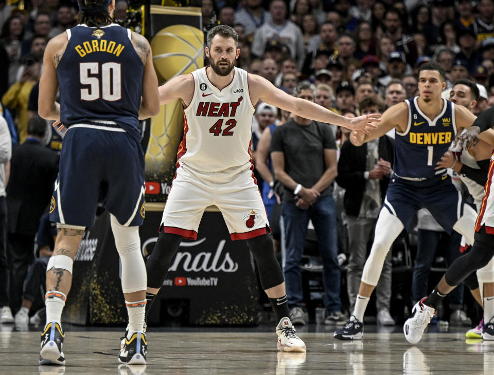 DENVER, CO - JUNE 4: Kevin Love (42) of the Miami Heat defends Aaron Gordon (50) of the Denver Nuggets in the first quarter during Game 2 of the NBA Finals at Ball Arena in Denver on Sunday, June 4, 2023. (Photo by AAron Ontiveroz/The Denver Post)