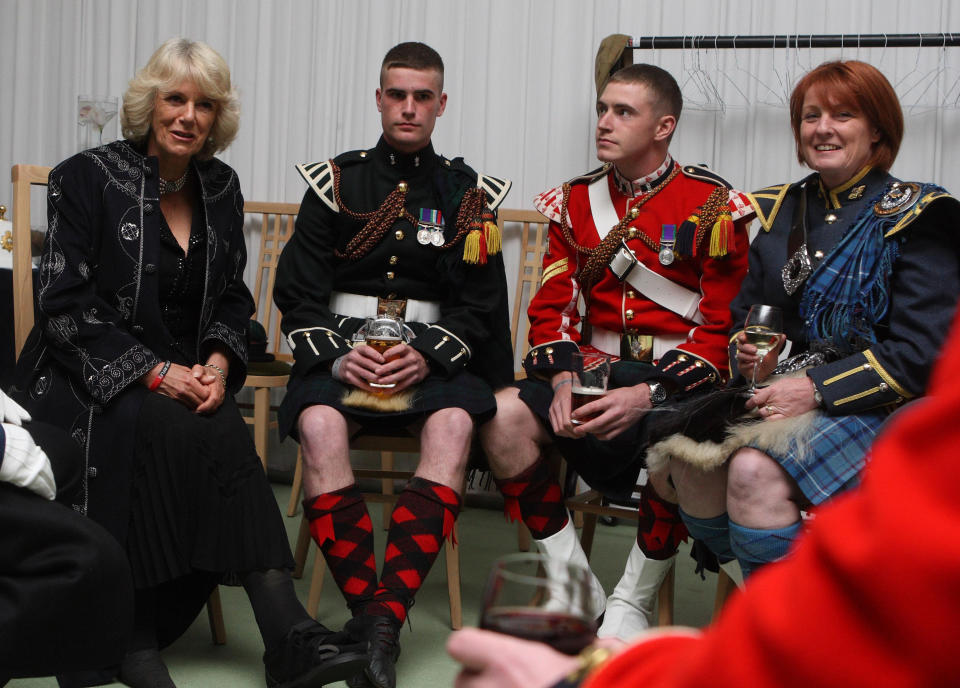 The Duchess of Cornwall, meets members from members of the armed forces, following their performance at the Windsor Castle Royal Tattoo, in Berkshire.   (Photo by Steve Parsons/PA Images via Getty Images)